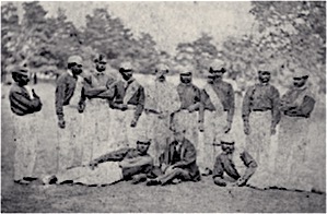 Lawrence's team of Aboriginal cricketers with Lawrence and William Shepherd, who helped manage and umpire the XI, on tour in Swansea, 1868 (State Library of NSW)