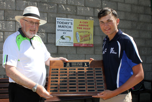 Joe Connolly presents U15 interpro shield to Tim Tector