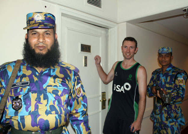 Bangladesh security in the Ireland team hotel corridor looking after Andrew White