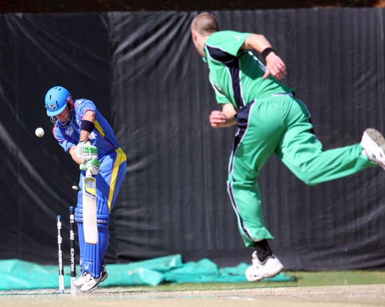 Ireland's Boyd Rankin bowls Craig Williams of Namibia