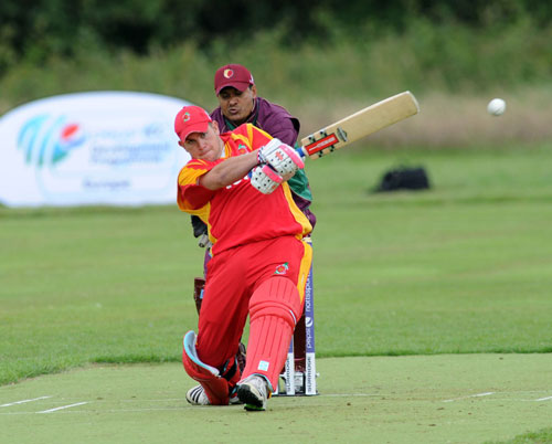 Oliver Webster hits a boundary against Portugal in the 2011 European Division 2 tournament