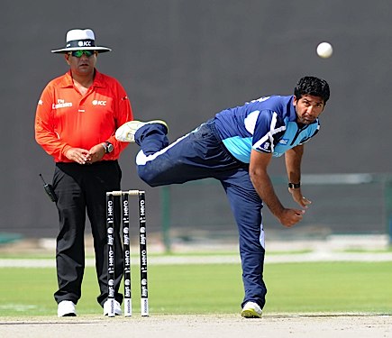 Majid Hag bowling against Namibia (Photo by Ian Jacobs/ICC)