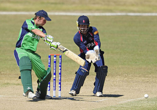 Ireland's Andy McBrine cuts in the match against Nepal (© ICC)