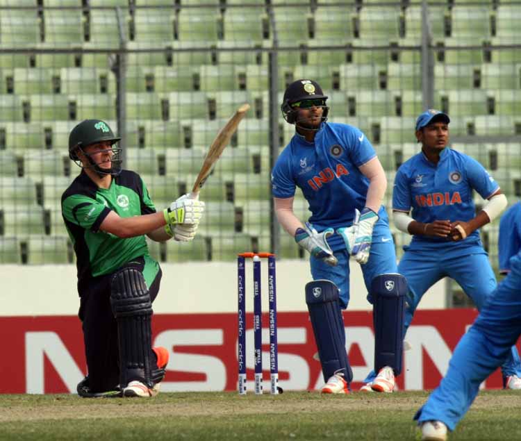 Ireland's William McClintock hits a six against India (© ICC)