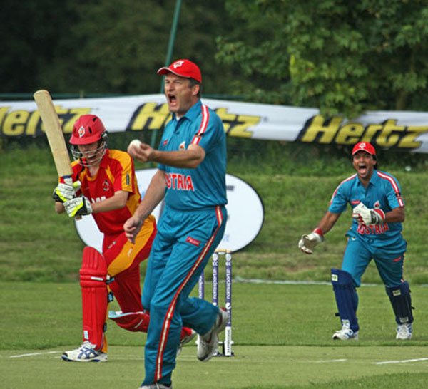 Andrew Simpson Parker takes a catch against Isle of Man in 2011