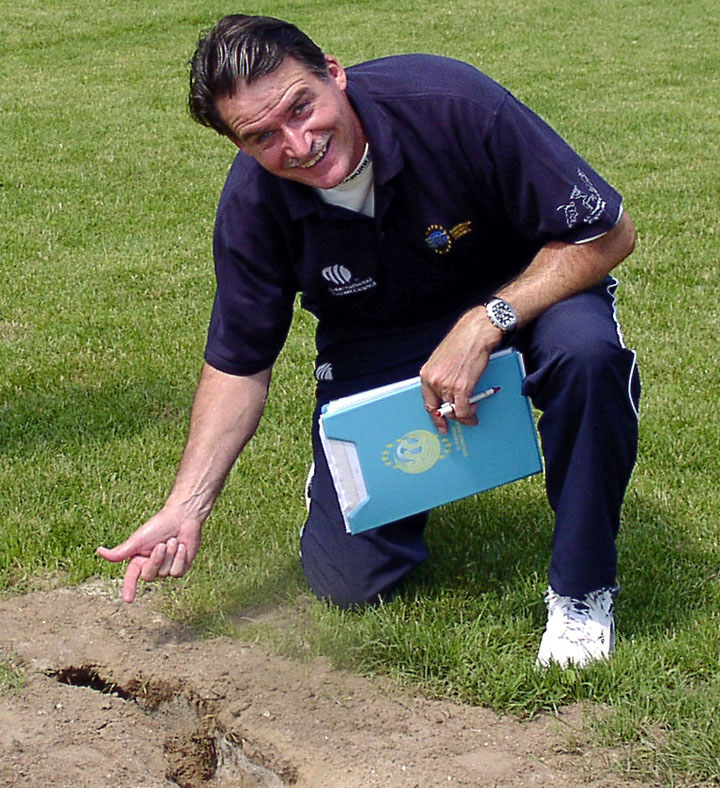 Inspecting the outfield at Mechelen, Belgium in 2004 (© CricketEurope)