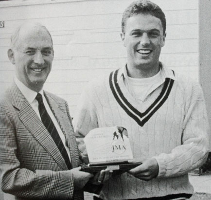 Alan Lewis presented with trophy by Frank Malin