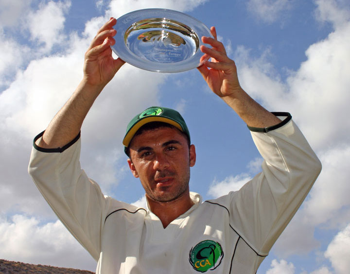 Michael Kyriacou with the 2009 European Division 4 trophy