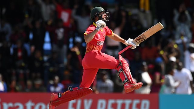 Sean Williams celebrates reaching his third century of the tournament