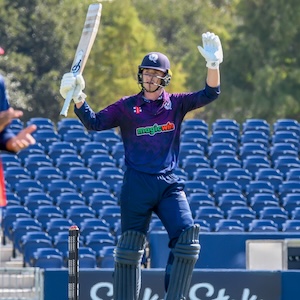 Brandon McMullen celebrates his century