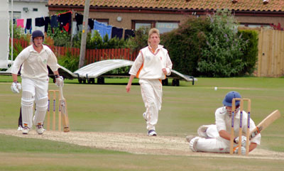 Ireland's Robert Rankin is floored by Dutch pace bowler Tom Heggleman