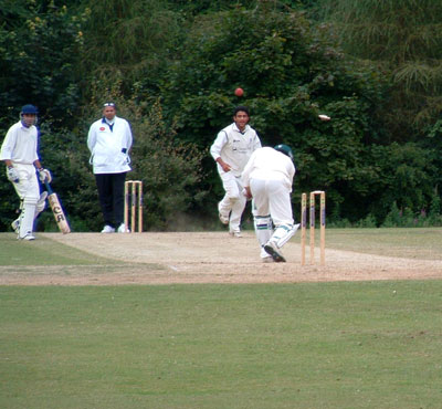 Martin Pedersen of Denmark is bowled by Scotland's Sean Weeraratna