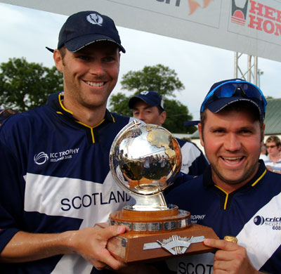 Holding the ICC Trophy with Ryan Watson in 2005