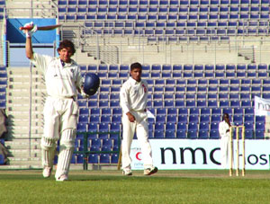 Fraser Watts acknowledges his century against Kenya